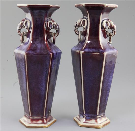 A pair of Chinese flambe glazed hexagonal baluster vases,